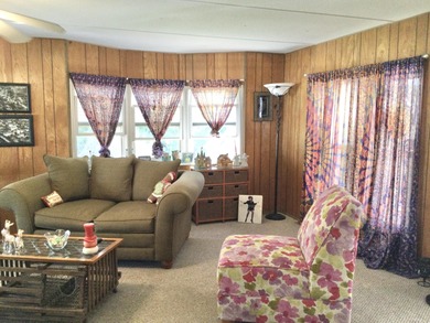 Nicely maintained home backing to a nature preserve.  This home on Spanish Lakes I in Florida - for sale on GolfHomes.com, golf home, golf lot