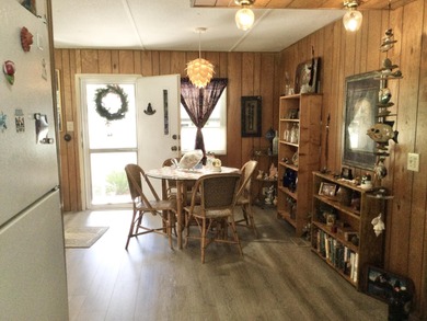 Nicely maintained home backing to a nature preserve.  This home on Spanish Lakes I in Florida - for sale on GolfHomes.com, golf home, golf lot