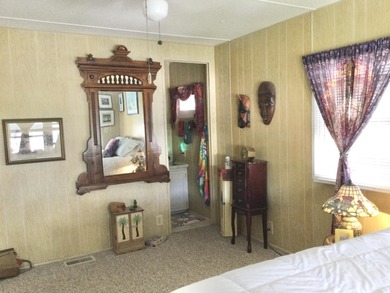 Nicely maintained home backing to a nature preserve.  This home on Spanish Lakes I in Florida - for sale on GolfHomes.com, golf home, golf lot