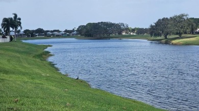 Absolutely Beautiful & stylish LAKEFRONT home. Divosta built on Monarch Country Club in Florida - for sale on GolfHomes.com, golf home, golf lot