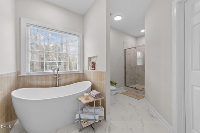 Beautifully renovated and truly move-in ready, this brick-front on Devils Ridge Golf Club in North Carolina - for sale on GolfHomes.com, golf home, golf lot