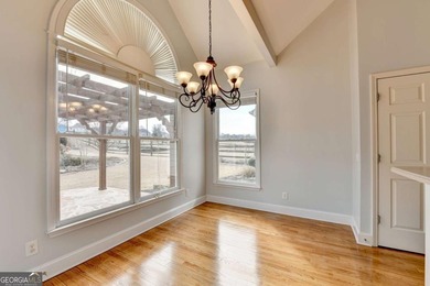 Welcome Home to this beautiful, easy-living residence perfectly on Hampton Golf Village in Georgia - for sale on GolfHomes.com, golf home, golf lot