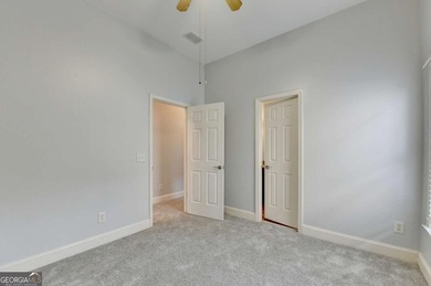 Welcome Home to this beautiful, easy-living residence perfectly on Hampton Golf Village in Georgia - for sale on GolfHomes.com, golf home, golf lot