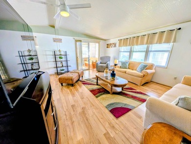 Welcome to this beautifully decorated home with new double pane on Grasslands Golf and Country Club in Florida - for sale on GolfHomes.com, golf home, golf lot