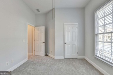 Welcome Home to this beautiful, easy-living residence perfectly on Hampton Golf Village in Georgia - for sale on GolfHomes.com, golf home, golf lot