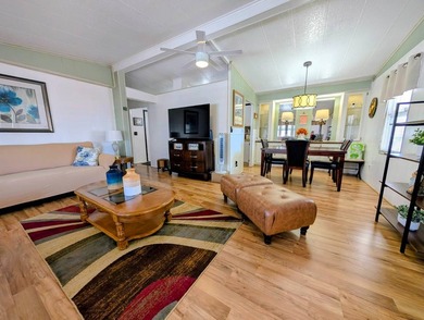 Welcome to this beautifully decorated home with new double pane on Grasslands Golf and Country Club in Florida - for sale on GolfHomes.com, golf home, golf lot