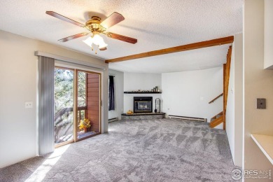 Nestled in the heart of Estes Park, this inviting 2-bedroom on Estes Park Golf Course in Colorado - for sale on GolfHomes.com, golf home, golf lot