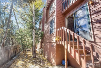 Nestled in the heart of Estes Park, this inviting 2-bedroom on Estes Park Golf Course in Colorado - for sale on GolfHomes.com, golf home, golf lot