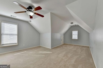 Welcome Home to this beautiful, easy-living residence perfectly on Hampton Golf Village in Georgia - for sale on GolfHomes.com, golf home, golf lot