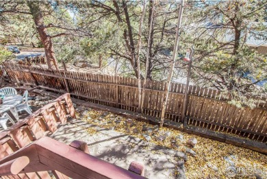 Nestled in the heart of Estes Park, this inviting 2-bedroom on Estes Park Golf Course in Colorado - for sale on GolfHomes.com, golf home, golf lot