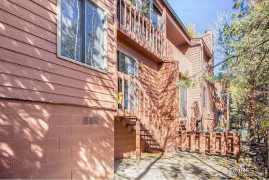 Nestled in the heart of Estes Park, this inviting 2-bedroom on Estes Park Golf Course in Colorado - for sale on GolfHomes.com, golf home, golf lot