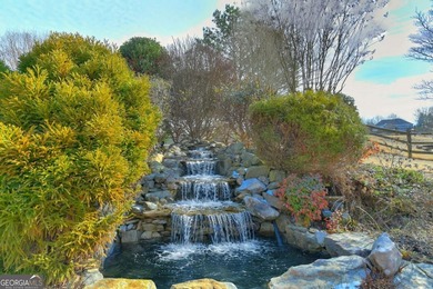 Welcome Home to this beautiful, easy-living residence perfectly on Hampton Golf Village in Georgia - for sale on GolfHomes.com, golf home, golf lot