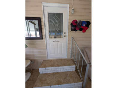 Welcome to this beautifully decorated home with new double pane on Grasslands Golf and Country Club in Florida - for sale on GolfHomes.com, golf home, golf lot