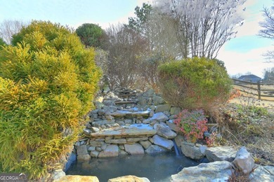 Welcome Home to this beautiful, easy-living residence perfectly on Hampton Golf Village in Georgia - for sale on GolfHomes.com, golf home, golf lot