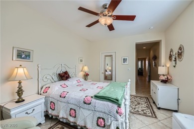 An extended Independence model home that features two master on Revere Golf Club in Nevada - for sale on GolfHomes.com, golf home, golf lot