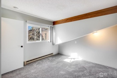 Nestled in the heart of Estes Park, this inviting 2-bedroom on Estes Park Golf Course in Colorado - for sale on GolfHomes.com, golf home, golf lot