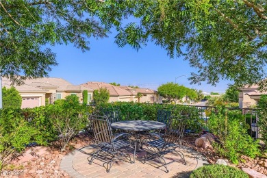 An extended Independence model home that features two master on Revere Golf Club in Nevada - for sale on GolfHomes.com, golf home, golf lot