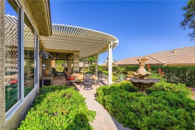 An extended Independence model home that features two master on Revere Golf Club in Nevada - for sale on GolfHomes.com, golf home, golf lot