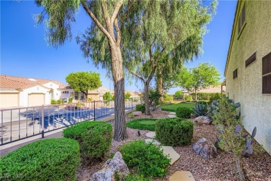 An extended Independence model home that features two master on Revere Golf Club in Nevada - for sale on GolfHomes.com, golf home, golf lot