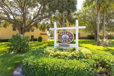 Fresh, sunny, ground-floor 2BR/2BA condo on the 6th fairway of on Miles Grant Country Club in Florida - for sale on GolfHomes.com, golf home, golf lot