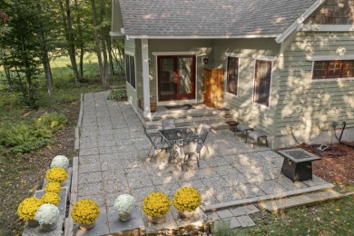 Experience year-round comfort and elegance in this like-new on Crystal Mountain Golf Course in Michigan - for sale on GolfHomes.com, golf home, golf lot