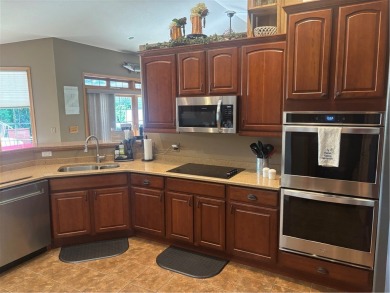 Discover this gem with everything you could wish for. Located on on Spider Lake Golf Resort in Wisconsin - for sale on GolfHomes.com, golf home, golf lot