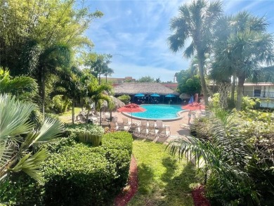 First floor unit right in front of the pool!  Located in the on The Moorings Country Club in Florida - for sale on GolfHomes.com, golf home, golf lot