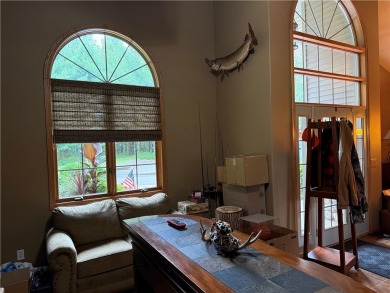 Discover this gem with everything you could wish for. Located on on Spider Lake Golf Resort in Wisconsin - for sale on GolfHomes.com, golf home, golf lot