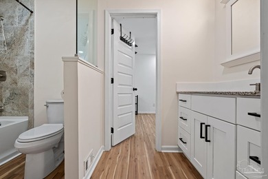 Welcome to this charming and thoughtfully updated 3-bedroom on Perdido Bay Golf Club in Florida - for sale on GolfHomes.com, golf home, golf lot