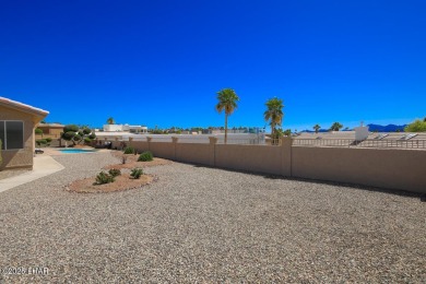 Located in the prestigious Lake Havasu Residential Estates, this on London Bridge Golf Course in Arizona - for sale on GolfHomes.com, golf home, golf lot