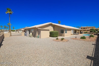 Located in the prestigious Lake Havasu Residential Estates, this on London Bridge Golf Course in Arizona - for sale on GolfHomes.com, golf home, golf lot