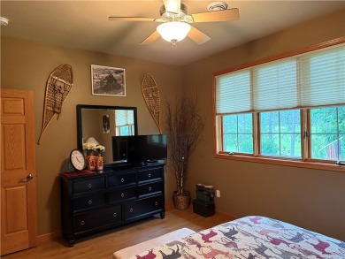 Discover this gem with everything you could wish for. Located on on Spider Lake Golf Resort in Wisconsin - for sale on GolfHomes.com, golf home, golf lot