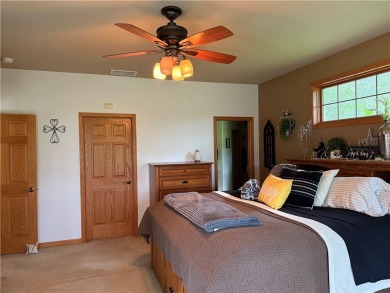Discover this gem with everything you could wish for. Located on on Spider Lake Golf Resort in Wisconsin - for sale on GolfHomes.com, golf home, golf lot