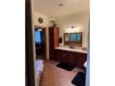 Discover this gem with everything you could wish for. Located on on Spider Lake Golf Resort in Wisconsin - for sale on GolfHomes.com, golf home, golf lot