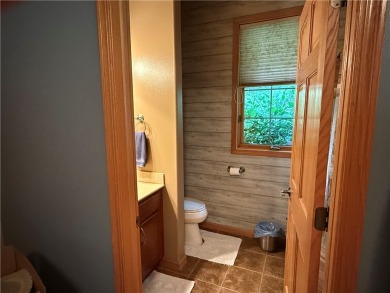 Discover this gem with everything you could wish for. Located on on Spider Lake Golf Resort in Wisconsin - for sale on GolfHomes.com, golf home, golf lot