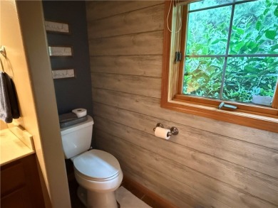 Discover this gem with everything you could wish for. Located on on Spider Lake Golf Resort in Wisconsin - for sale on GolfHomes.com, golf home, golf lot