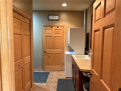 Discover this gem with everything you could wish for. Located on on Spider Lake Golf Resort in Wisconsin - for sale on GolfHomes.com, golf home, golf lot