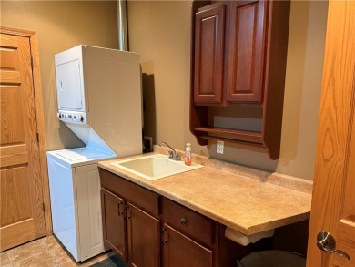 Discover this gem with everything you could wish for. Located on on Spider Lake Golf Resort in Wisconsin - for sale on GolfHomes.com, golf home, golf lot