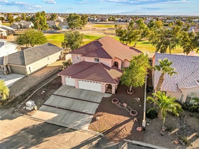 PRICED TO SELL! Stunning two-story home backing Desert Lakes on Desert Lakes Golf Course in Arizona - for sale on GolfHomes.com, golf home, golf lot