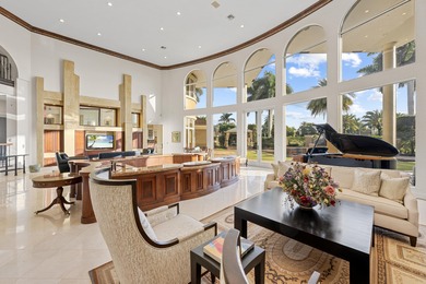 Masterfully designed, this exclusive Boca Grove estate rests on on Boca Grove Golf and Tennis in Florida - for sale on GolfHomes.com, golf home, golf lot