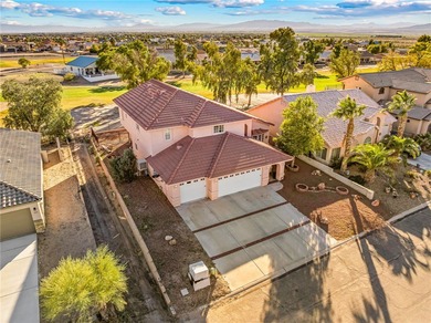 PRICED TO SELL! Stunning two-story home backing Desert Lakes on Desert Lakes Golf Course in Arizona - for sale on GolfHomes.com, golf home, golf lot