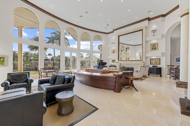 Masterfully designed, this exclusive Boca Grove estate rests on on Boca Grove Golf and Tennis in Florida - for sale on GolfHomes.com, golf home, golf lot