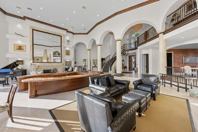 Masterfully designed, this exclusive Boca Grove estate rests on on Boca Grove Golf and Tennis in Florida - for sale on GolfHomes.com, golf home, golf lot