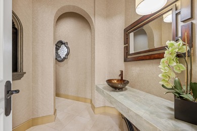 Masterfully designed, this exclusive Boca Grove estate rests on on Boca Grove Golf and Tennis in Florida - for sale on GolfHomes.com, golf home, golf lot