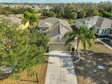 TERRIFIC PRICE IMPROVEMENT FOR THIS CHARMING HOME WITH PRETTY on Sandpiper Golf Club in Florida - for sale on GolfHomes.com, golf home, golf lot