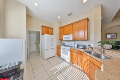 TERRIFIC PRICE IMPROVEMENT FOR THIS CHARMING HOME WITH PRETTY on Sandpiper Golf Club in Florida - for sale on GolfHomes.com, golf home, golf lot