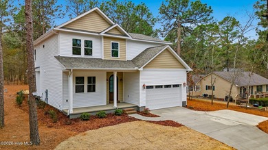 Situated at 139 Lancashire Lane in the gated Seven Lakes South on Seven Lakes Country Club in North Carolina - for sale on GolfHomes.com, golf home, golf lot