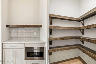 Situated at 139 Lancashire Lane in the gated Seven Lakes South on Seven Lakes Country Club in North Carolina - for sale on GolfHomes.com, golf home, golf lot