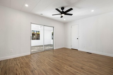 This fully renovated manufactured home is now available for sale on Date Palm Country Club in California - for sale on GolfHomes.com, golf home, golf lot
