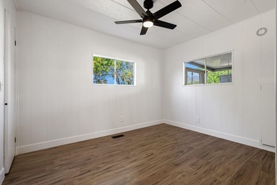 This fully renovated manufactured home is now available for sale on Date Palm Country Club in California - for sale on GolfHomes.com, golf home, golf lot